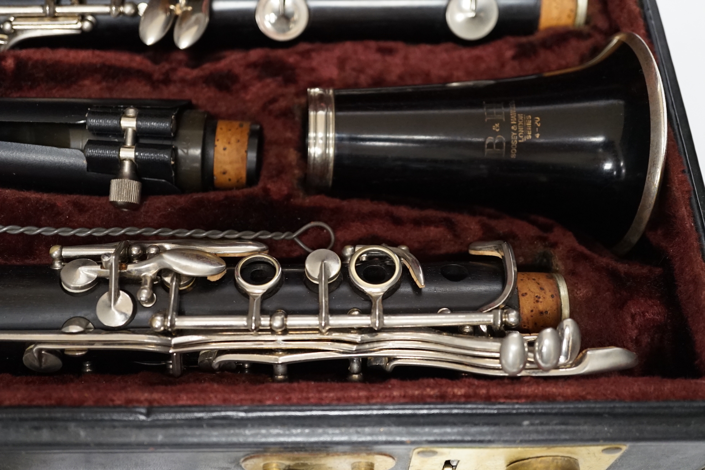 A cased Boosey & Hawkes 4-20 clarinet, in a fine original fitted leather case